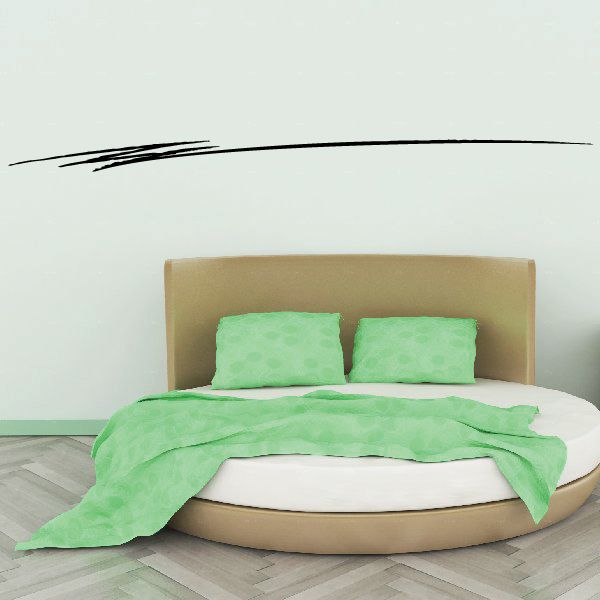 Black pinstripe vinyl decal with sweeping lines on wall