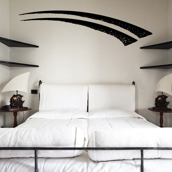 Black curved pinstripe vinyl decal with double swoosh line