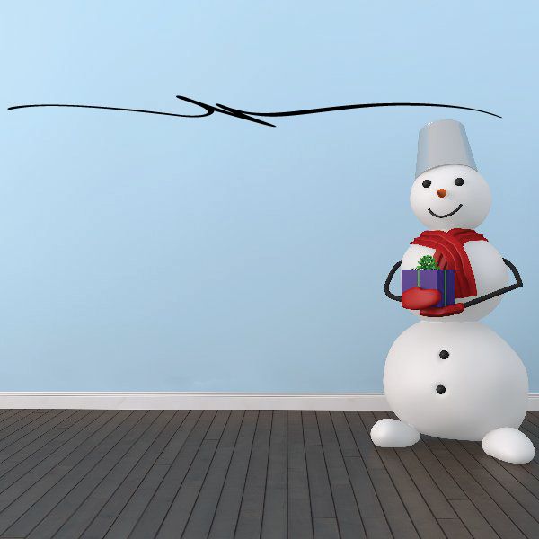 Snowman vinyl decal with red scarf and black dot eyes, on a flat surface