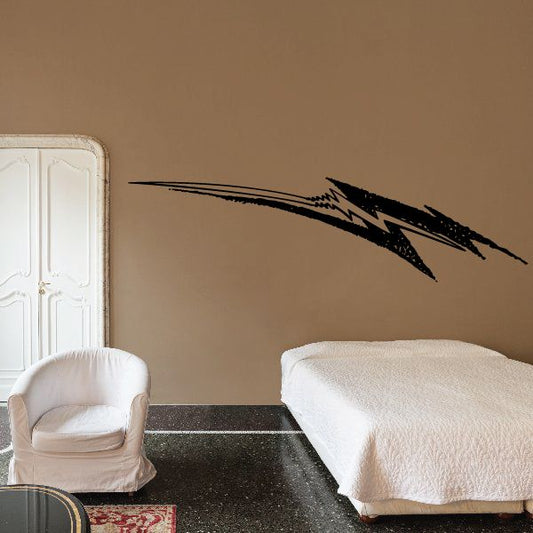 Black pinstripe lightning vehicle vinyl decal with arrow graphic on wall
