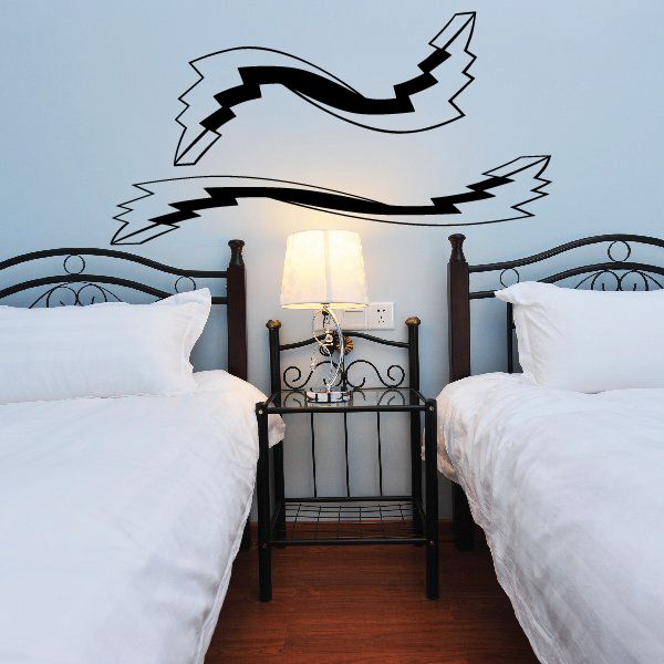 Black pinstripe vehicle vinyl decal, ribbon-like swoosh design on wall