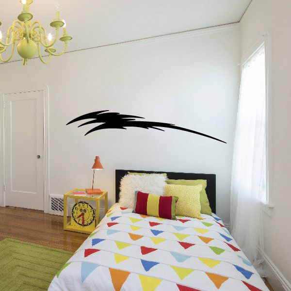 Vehicle pinstripe vinyl decal with a black curved stripe swoosh on a wall