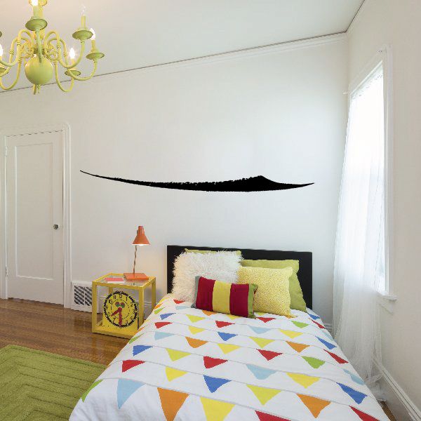 Black curved pinstripe vinyl decal with swoosh shape on wall