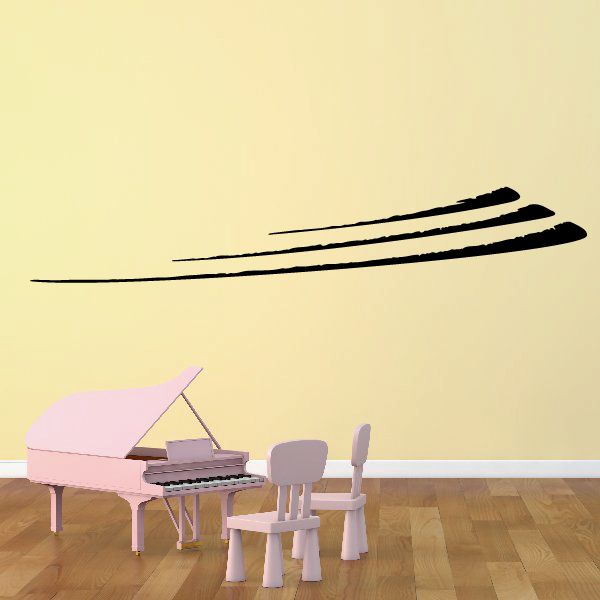 Black vehicle pinstripe vinyl decal with twin swoosh stripes on wall