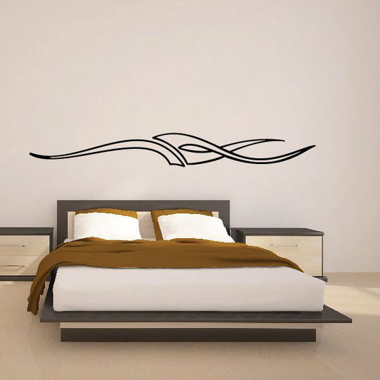 Black pinstripe vinyl decal with sweeping tribal flame-style lines