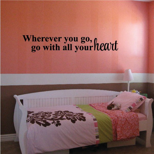 Wall decal text: 'Wherever you go' and 'go with all your heart'.