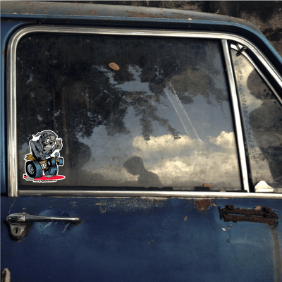 Vehicle window showcasing a decorative blue sticker