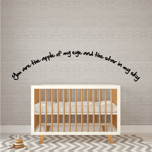 Wall decal with black cursive quote: “apple of my eye” and “star in my sky”