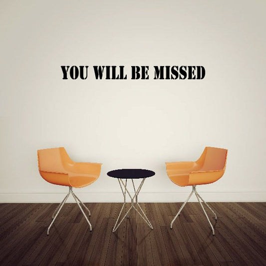 Memorial wall decal reading “YOU WILL BE MISSED” in bold black letters
