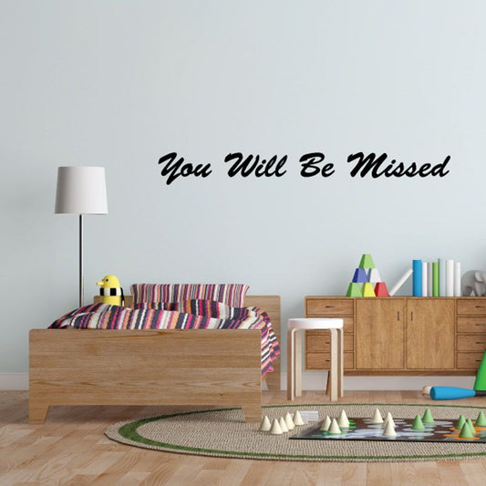 Remembrance wall decal reading 'You Will Be Missed' in black script.