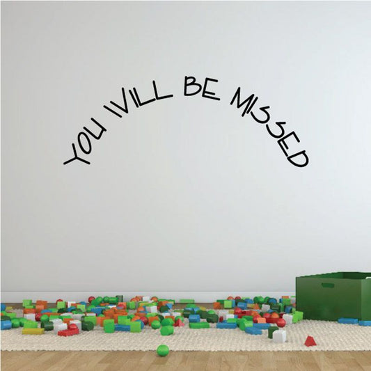Wall decal with black vinyl lettering reading “YOU WILL BE MISSED”