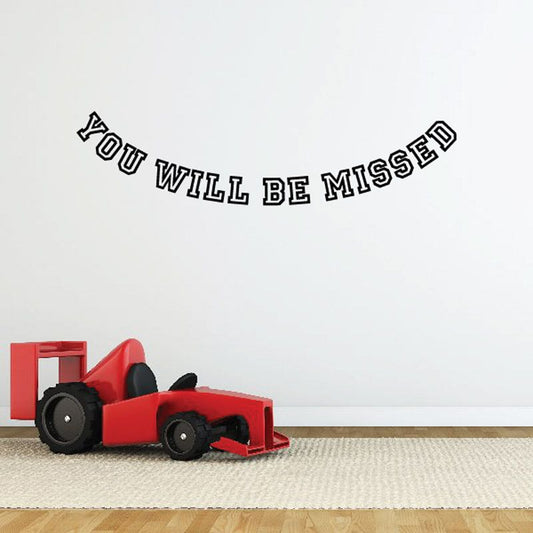 Vinyl wall decal with bold black "You will be missed" lettering