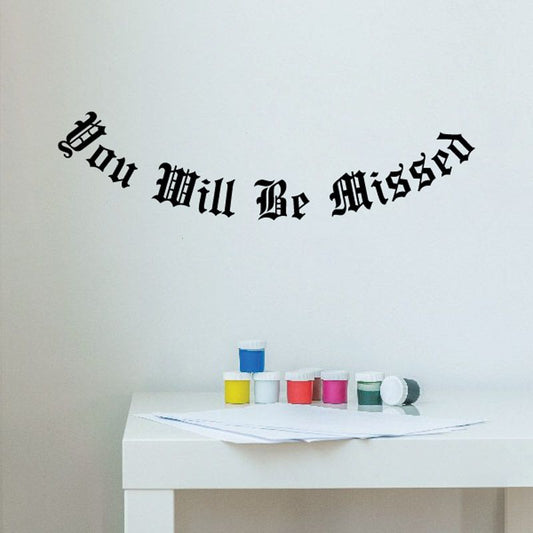 Memorial wall decal with gothic black lettering: “You will be missed”
