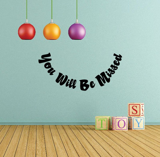 Memorial wall decal with curved black text: “You Will Be Missed”