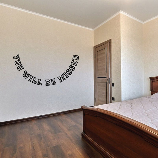 Memorial wall vinyl decal with curved text reading “YOU WILL BE MISSED”