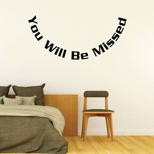 Wall decal with curved text: “You Will Be Missed”