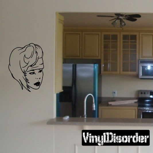 80s hair decal: black line art of a woman’s face with short bob haircut