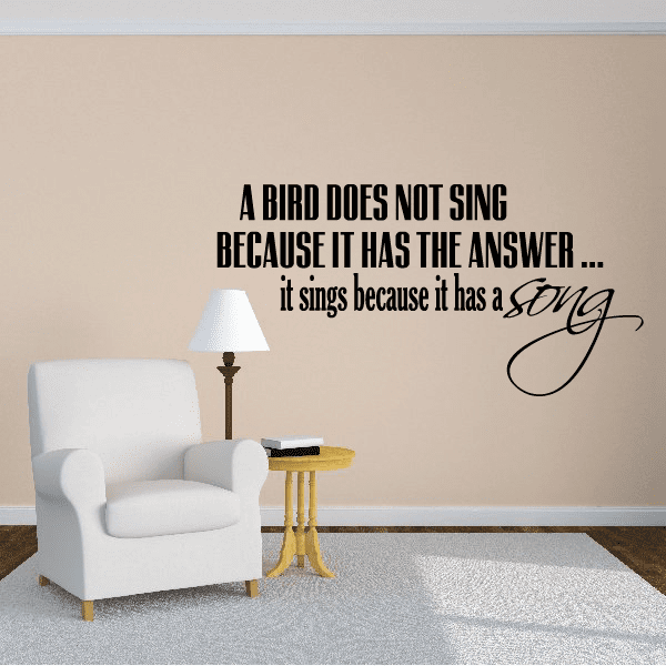 Black wall quote decal: “A bird does not sing...” with flowing “sing” script