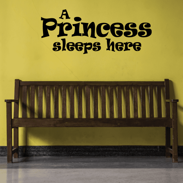 Wall decal with large 'Princess' and 'sleeps here' lettering