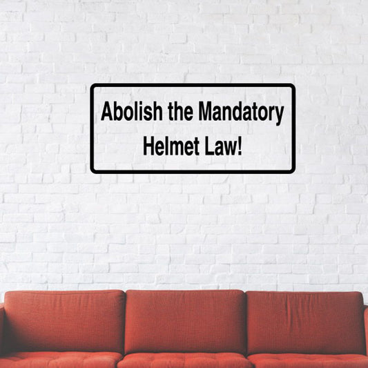 Black-outlined sticker decal: “Abolish the Mandatory Helmet Law!”