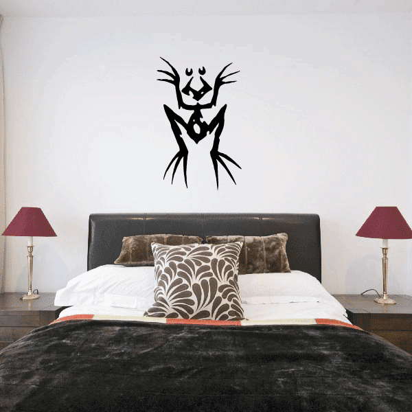 Abstract frog wall decal, black stylized design with cartoon face and arms