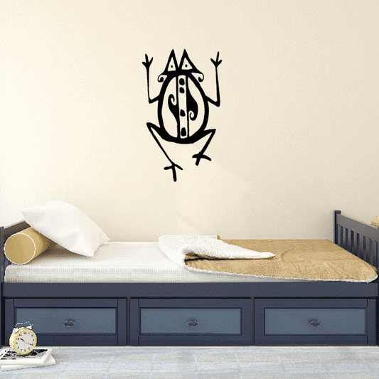 Frog wall decal with abstract tribal face design in black