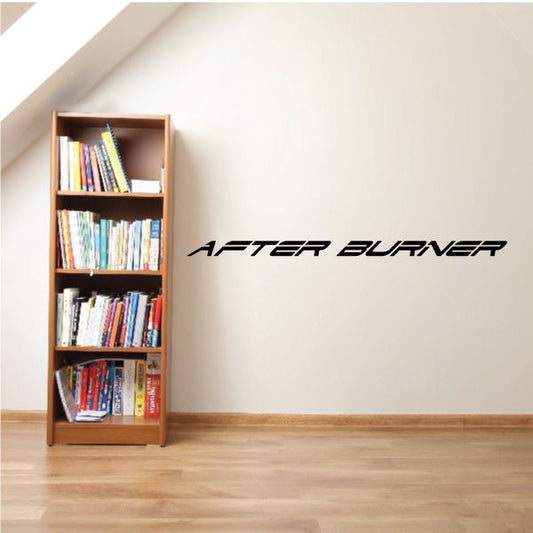 After burner decal with stylized black text on light wall