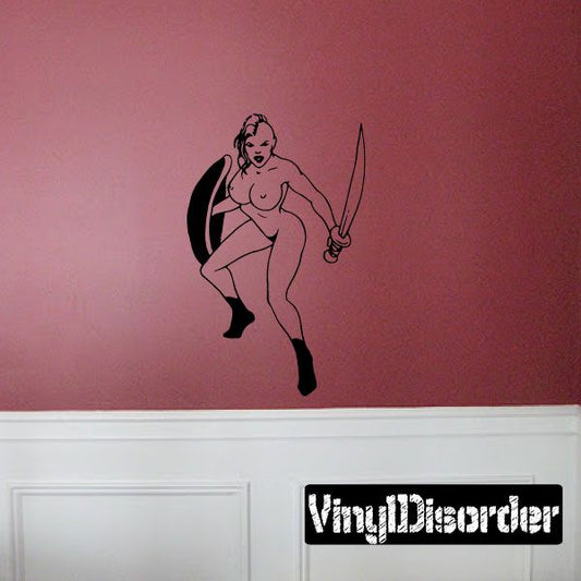 Wall decal of bare-chested shieldmaiden with sword, black outline