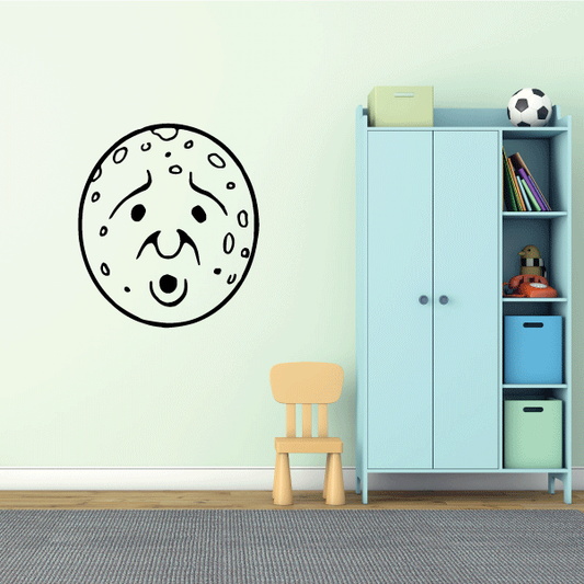 Moon face wall decal with alarm expression and small crater dots