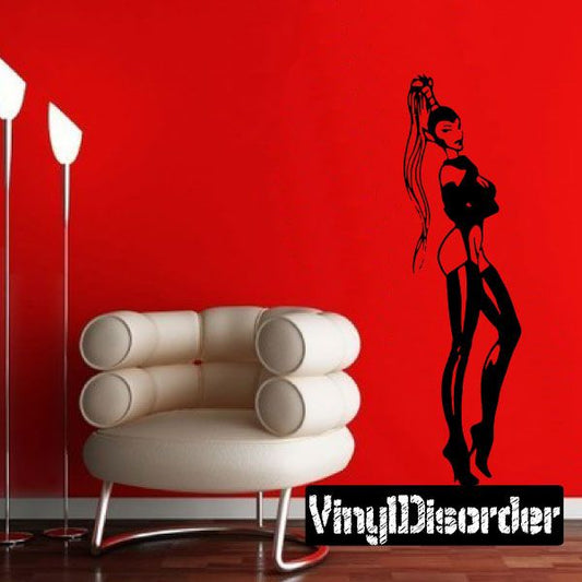 Alien stripper wall decal, black pinup-style figure with raised hand and stylized body art