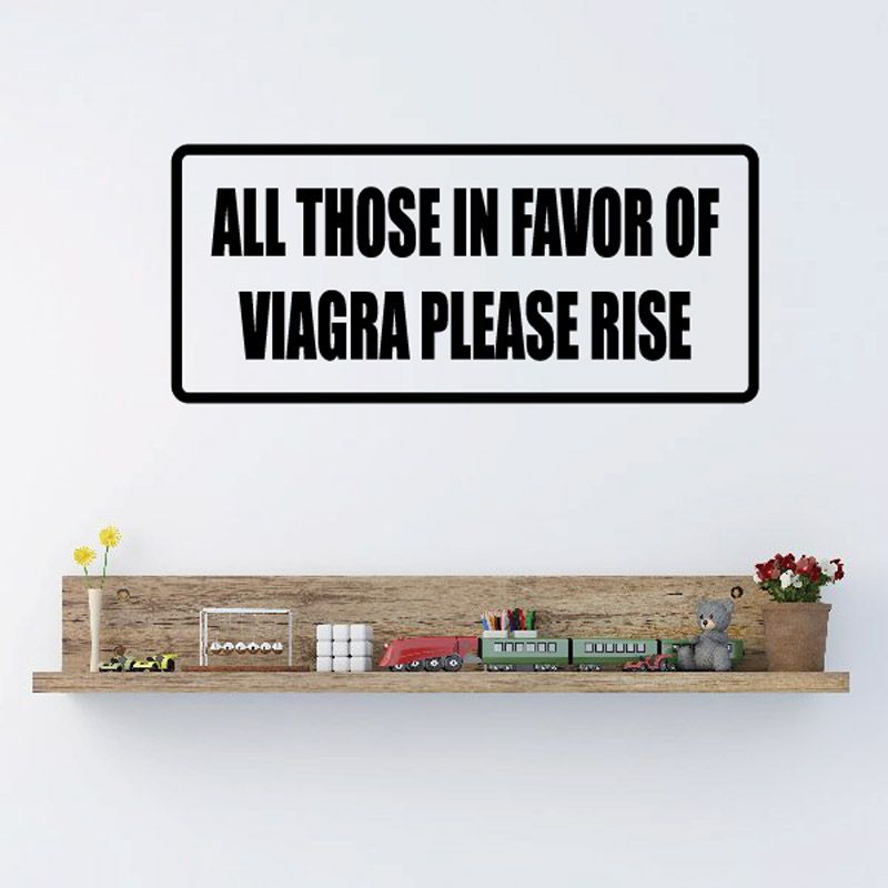 White wall decal with bold black quote: 'All those in favor of viagra please rise'