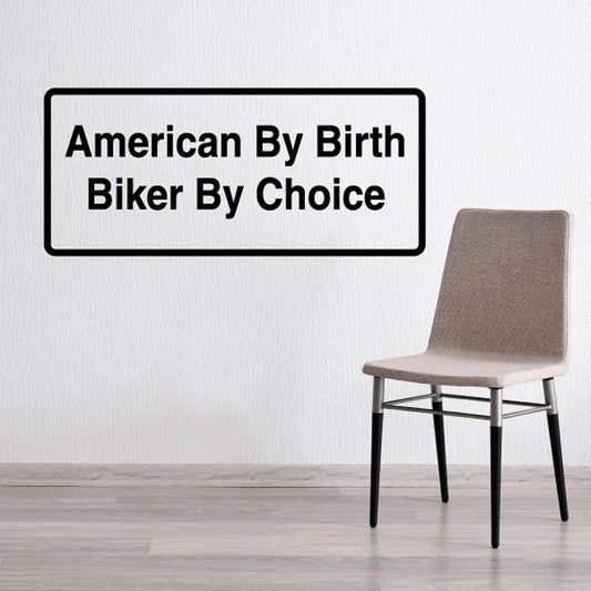 Rectangular vinyl wall decal with black border and white text: American By Birth Biker By Choice