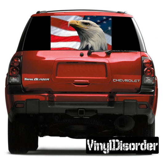 Red SUV rear window decal with American flag and eagle graphic view