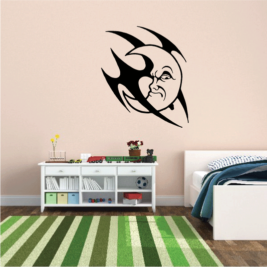 Angry moon face wall decal with black flames and white facial features