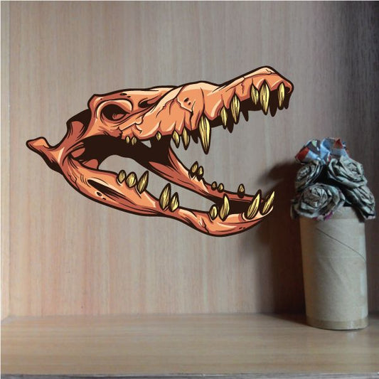 Alligator skull sticker with orange-brown skull and gold teeth illustration