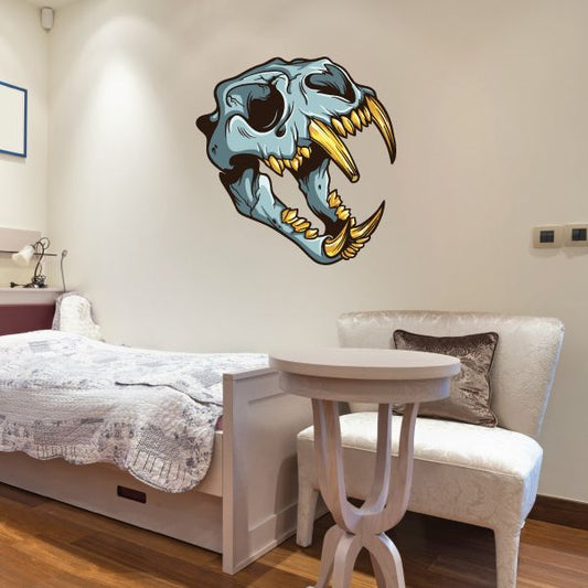 Big cat skull sticker with teal-gray skull and gold fanged teeth