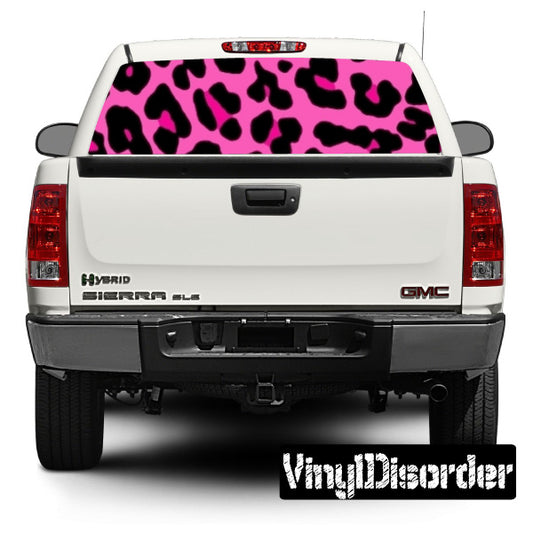 Pink leopard rear window graphic on white pickup truck tailgate