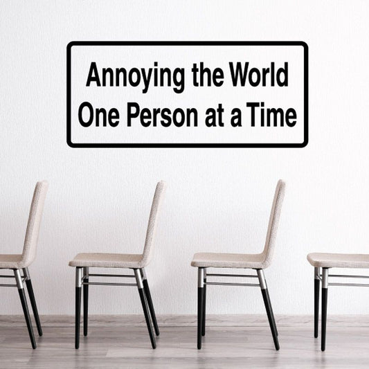 Wall decal with bold text: “Annoying the World One Person at a Time”