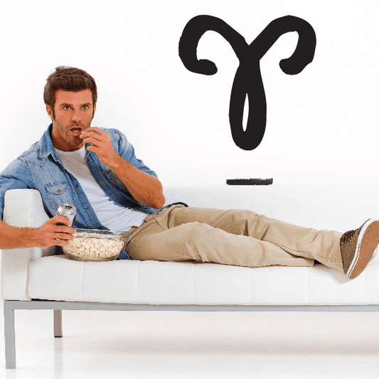 Aries ram wall decal with curved horns, black silhouette