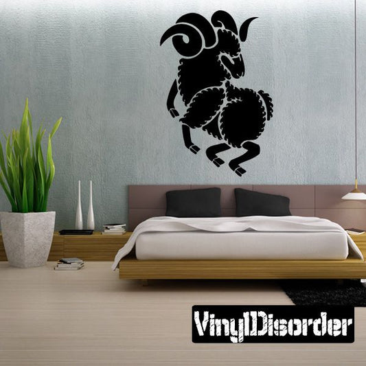 Black ram head wall decal with curled horns and detailed silhouette.