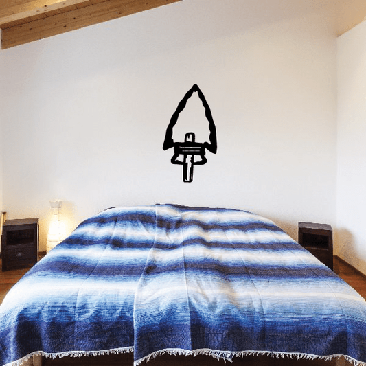 Black arrowhead notched to a stick wall decal