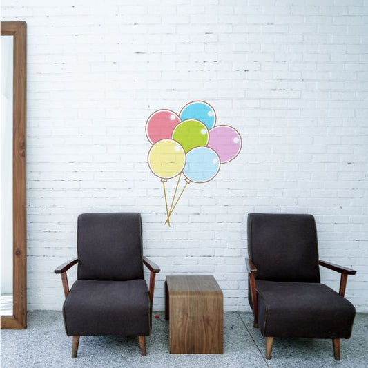 Round balloon cluster sticker with flat colors: red, green, yellow, blue, pink, purple