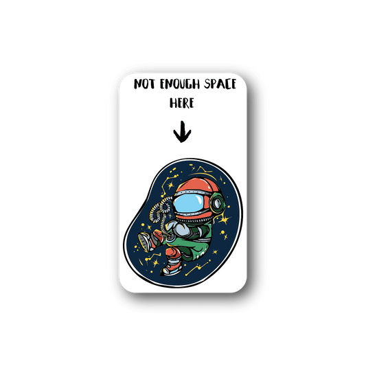 Vinyl baby astronaut sticker, reads 'NOT ENOUGH SPACE HERE' with arrow