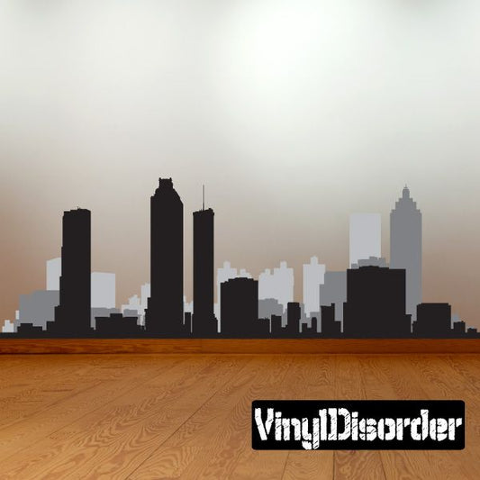 Atlanta skyline decal, black die-cut buildings with printed gray details and logo text