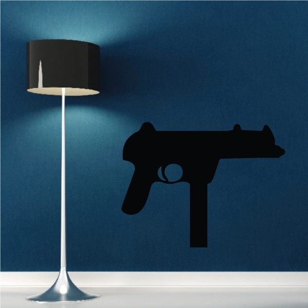 Automatic handgun wall decal with black silhouette, simple outline.