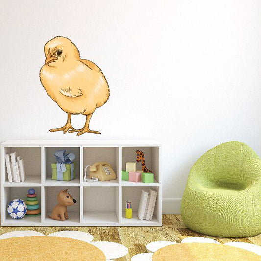 Baby chick sticker of a yellow chick with orange beak and feet