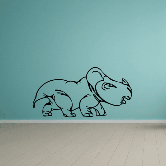 Baby triceratops wall decal, light teal cartoon dinosaur with short horns and tail.