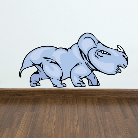 Baby triceratops sticker with light blue cartoon dinosaur lying down