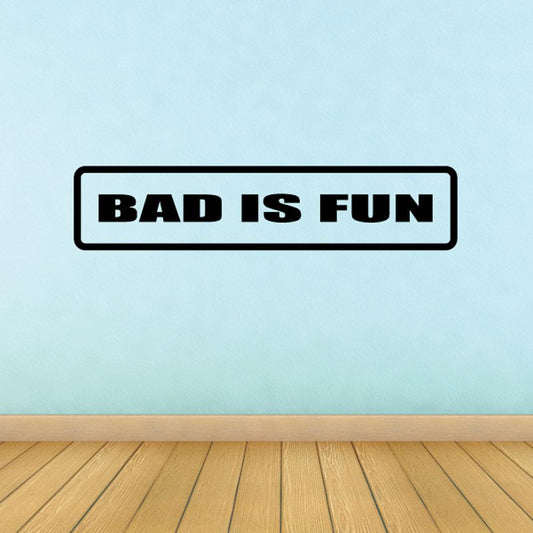 Vinyl wall decal with bold 'BAD IS FUN' lettering in black