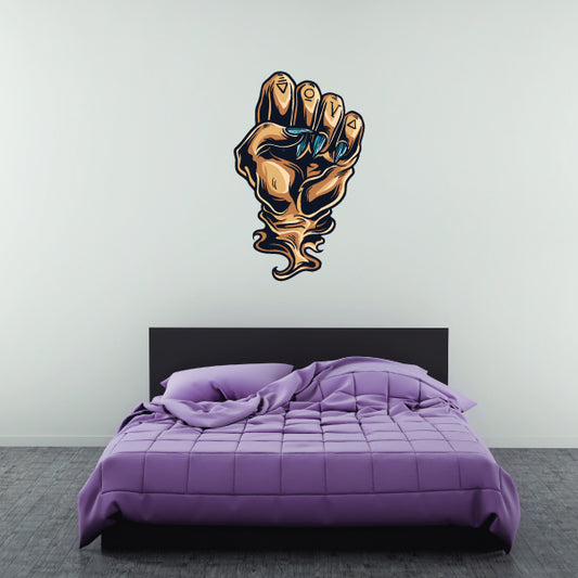 Die-cut decal of a cartoon monster fist with barbed wire, blue and tan.